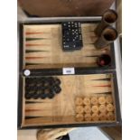 A VINTAGE BACKGAMMON SET AND DOMINOES