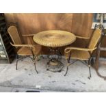 A RATTAN STYLE BISTRO SET WITH TABLE AND TWO CHAIRS