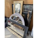 A LARGE QUANTITY OF FRAMED DECORATIVE MIRRORS