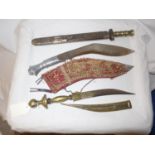 A KUKRI KNIFE, 29CM BLADE AND TWO FURTHER KNIVES