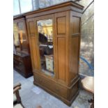 A LATE VICTORIAN OAK MIRROR-DOOR WARDROBE, 49" WIDE