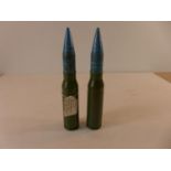 A PAIR OF INERT 25x137 BUSHMASTER ROUNDS