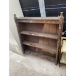 A LATE VICTORIAN OAK THREE DIVISION WALL SHELF WITH TURNED AND KNURLED UPRIGHTS, 34" WIDE