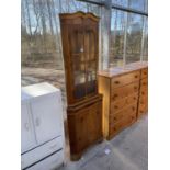 A MODERN YEW WOOD CORNER CUPBOARD