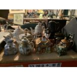 A COLLECTION OF VARIOUS CERAMIC TEAPOTS