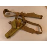 A WORLD WAR II PERIOD HOLSTER DATED 1942 AND A BELT