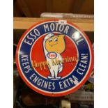 A METAL CIRCULAR 'ESSO MOTOR OIL' SIGN