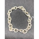 A HEAVY SILVER BRACELET MARKED 925