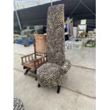 A MODERN HIGH BACK SINGLE ARM UPHOLSTERED CHAIR WITH ZEBRA DESIGN COVERING