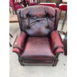 AN OX BLOOD 'CENTURION FURNITURE' EASY CHAIR