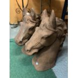 A PAIR OF LARGE CAST (IN THE TERRACOTTA STYLE) HORSES HEADS H:47CM