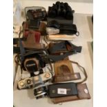 A SELECTION OF VINTAGE CAMERAS AND A PAIR OF BINOCULARS