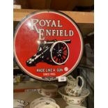 A METAL CIRCULAR 'ROYAL ENFIELD' SIGN