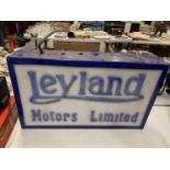 AN ILLUMINATED 'LEYLAND MOTORS LIMITED' SIGN