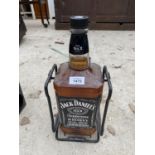 A DECORATIVE JACK DANIELS BOTTLE AND STAND (CONTENTS NOT WHISKEY)