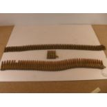 THREE INERT MACHINE GUN BELTS, LENGTHS 8CM, 77CM AND 87CM