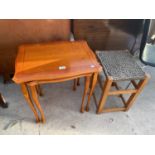 A NEST OF TWO TABLES AND SMALL STOOL
