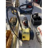 A KARCHER B503 PRESSURE WASHER BELIEVED IN WORKING ORDER BUT NO WARRANTY