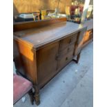 AN EARLY 20TH CENTURY OAK SIDEBOARD, 53" WIDE