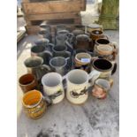 A LARGE COLLECTION OF TANKARDS TO INLCUDE SOME PEWTER AND SOME CERAMIC