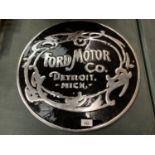 A 'FORD MOTOR COMPANY' BLACK AND SILVER METAL SIGN (D: 49.5CM)