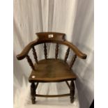 A VICTORIAN CHILD'S OAK CAPTAINS ARMCHAIR