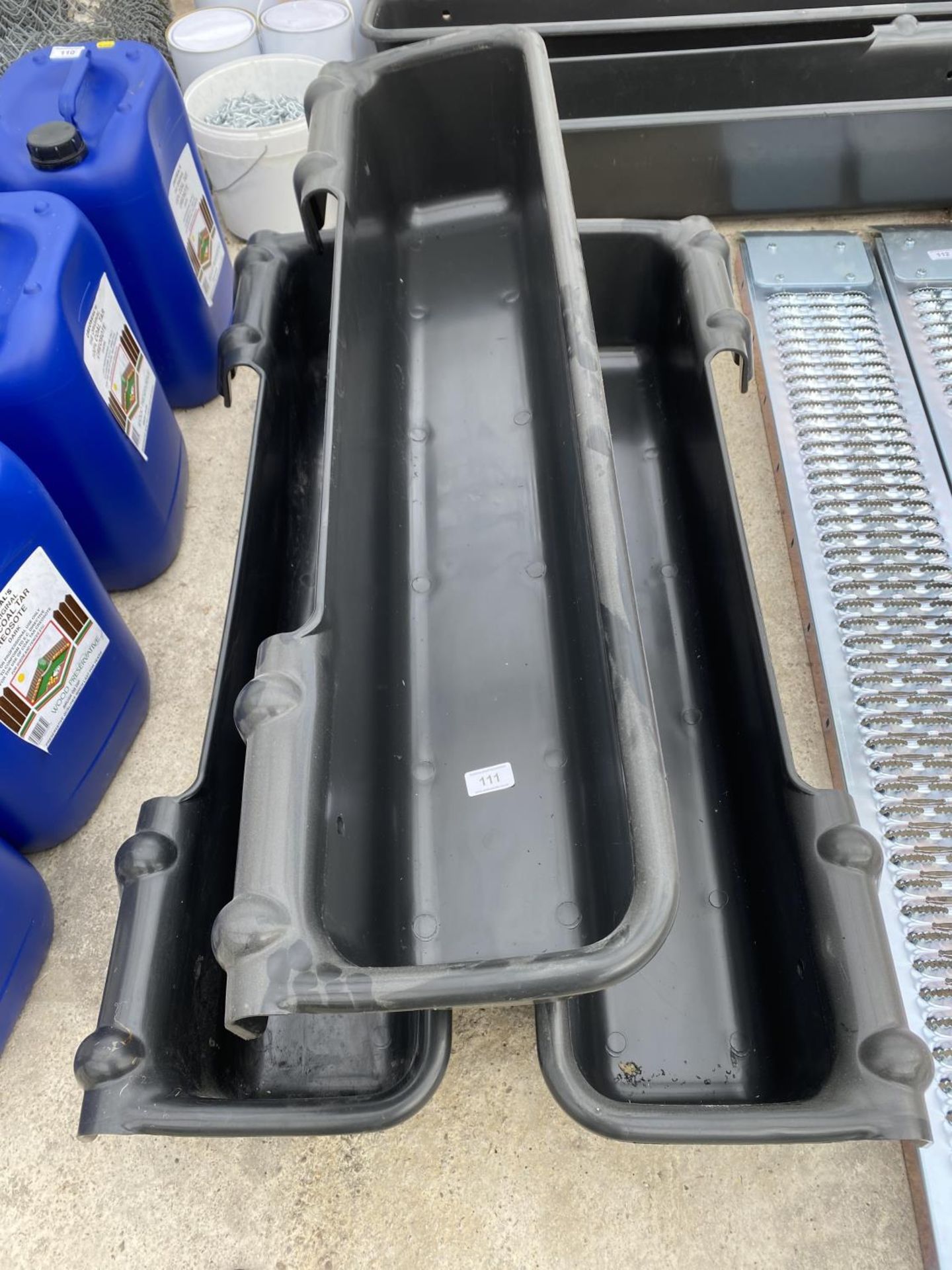 THREE 4' BLACK PLASTIC HANGING TROUGHS 4' LONG +VAT