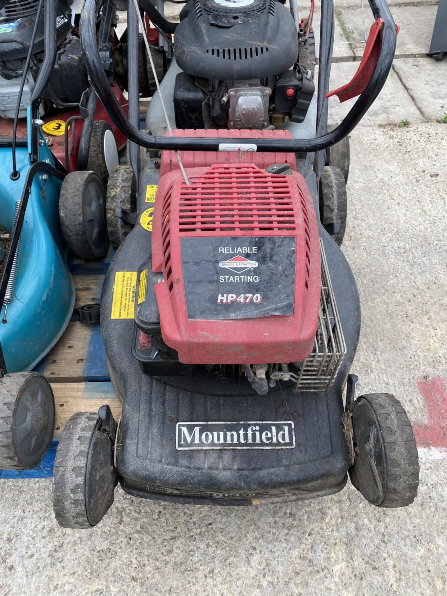 FOUR LAWN MOWERS - A MOUNTFIELD WITH 4.5 HONDA ENGINE, A MOUNTFIELD HP470 WITH B & S ENGINE A WOLF - Image 2 of 6