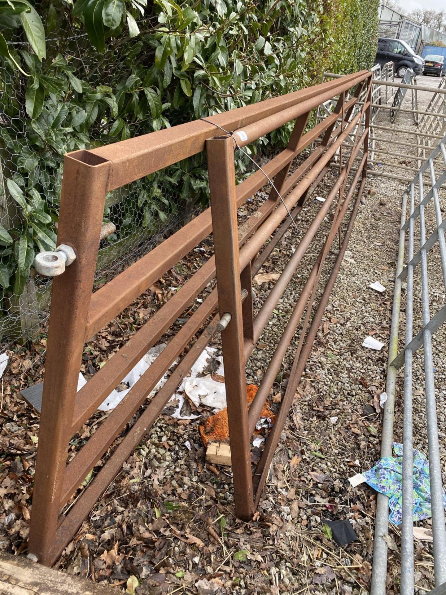 TWO GATES 1X 16'10" 1X 18'10" NOT DIPPED. + VAT