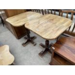 A PAIR OF WOODEN PUB TABLES