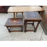 TWO EARLY 20TH CENTURY SMALL OAK TABLES ON BARLEYTWIST LEGS AND CARVED TOPS