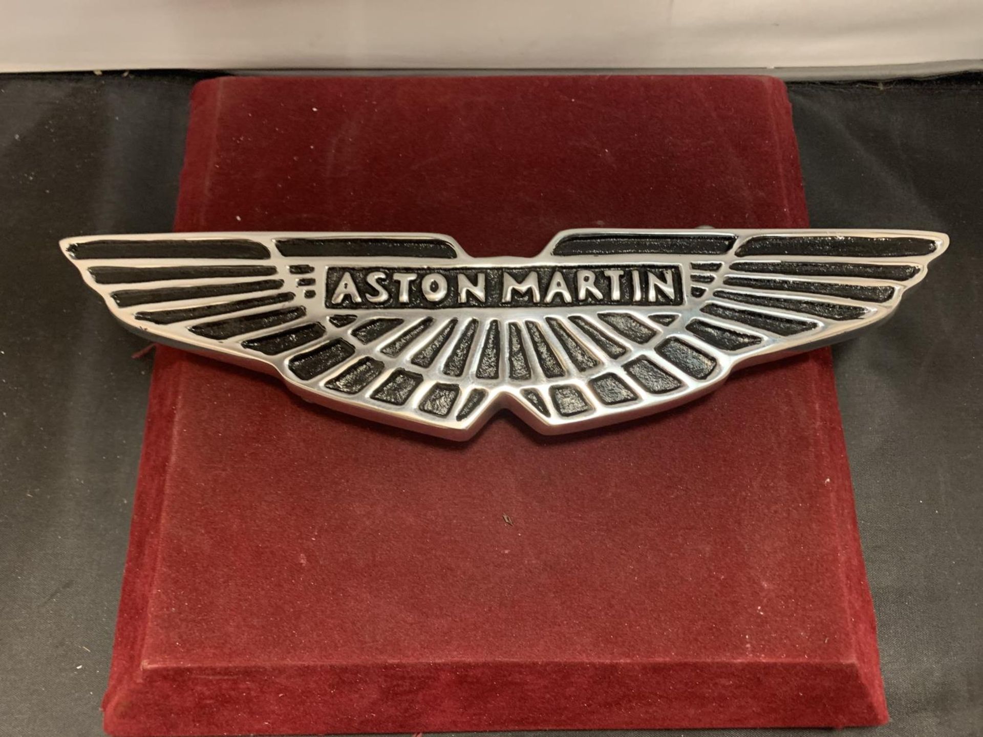 A CAST 'ASTON MARTIN' SIGN