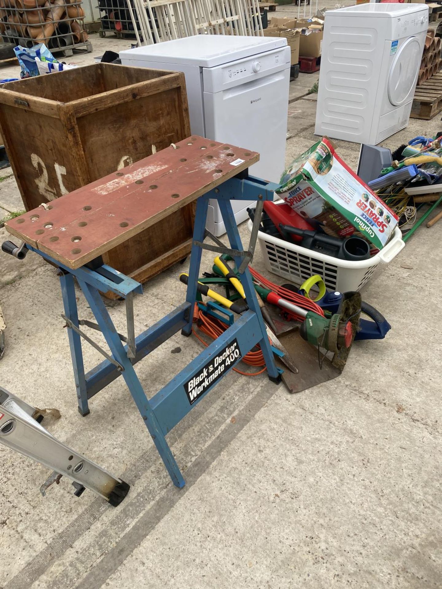 A BLACK AND DECKER WORKMATE, A BARROW TOP CONTAINING GARDEN TOOLS AND VARIOUS GARDEN TOOLS