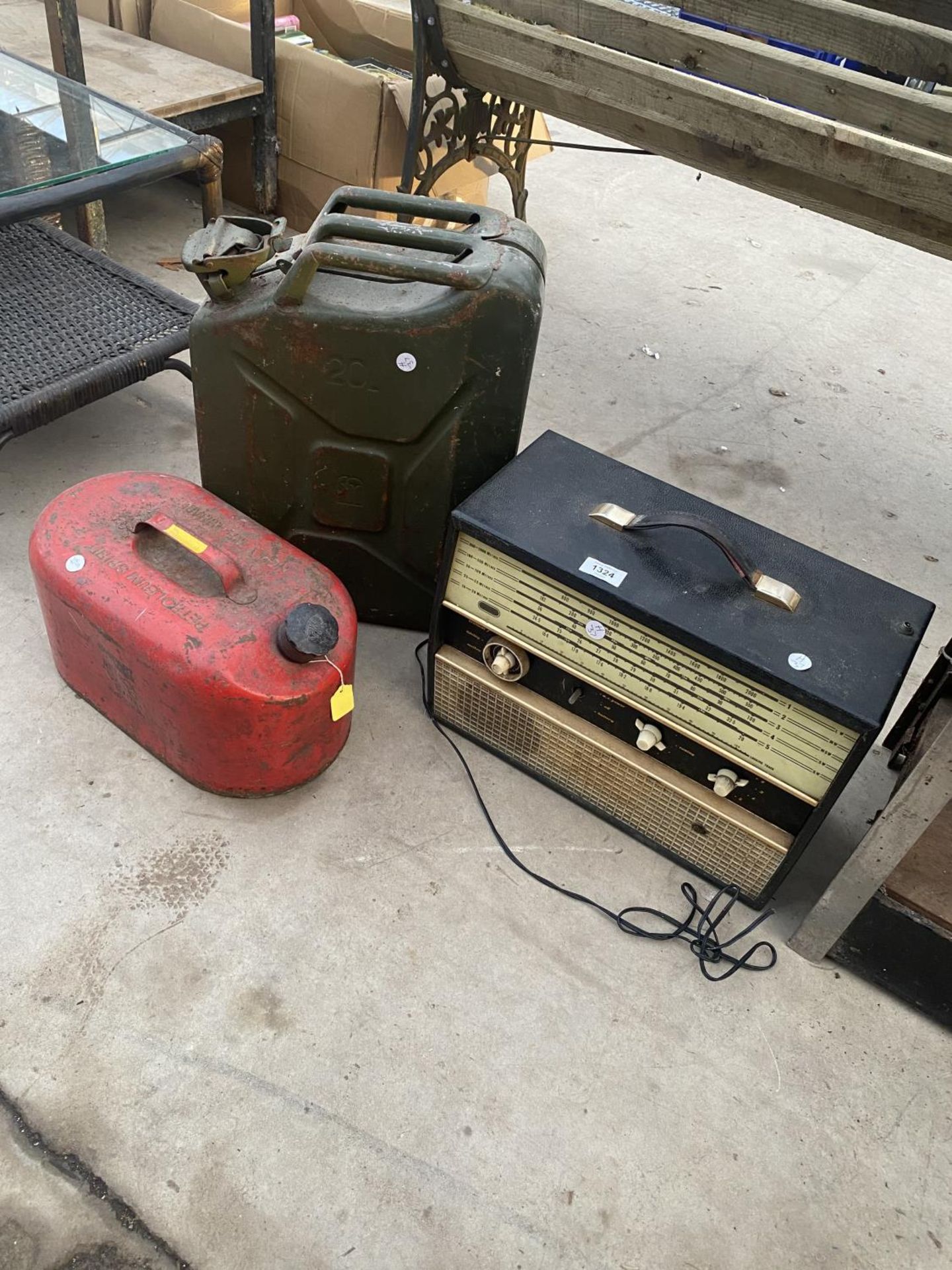 A VINTAGE PYE RADIO, A VINTAGE PETROLEUM SPIRIT FUEL CAN AND A FURTHER JERRY CAN
