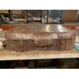 A RETRO PIG SKIN SUITCASE