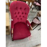 A VICTORIAN MAHOGANY OPEN EASY CHAIR WITH BUTTON BACK RED UPHOLSTERY