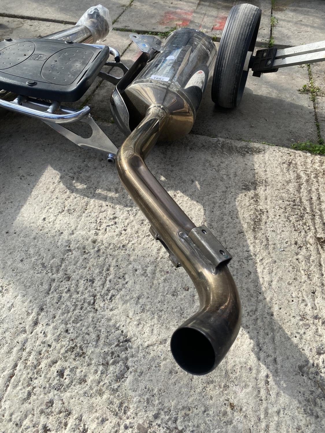 A TRIUMPH EXHAUST PIPE AND FURTHER MOTOR SPARES - Image 4 of 4