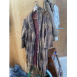 A LADIES LONG FUAX FUR COAT