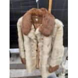 A FAUX FUR LADIES COAT