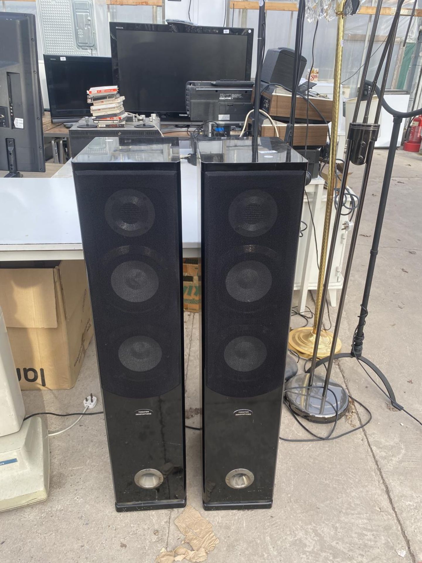 A PAIR OF TALL THEATER INNOVATIONS SPEAKERS BELIEVED IN WORKING ORDER BUT NO WARRANTY