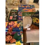 AN ASSORTMENT OF BOARD GAMES TO INCLUDE KER-PLUNK AND TRIVIAL PURSUIT