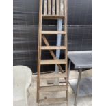 A VINTAGE SIX RUNG WOODEN STEP LADDER