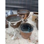 AN ASSORTMENT OF COPPER AND BRASS ITEMS TO INCLUDE TWO COPPER PLANTERS WITH STANDS ETC