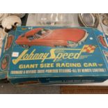 A VINTAGE TOPPER TOYS JOHNNY SPEED E-TYPE JAGUAR MODEL CAR TO INCLUDE THE ORIGINAL DRIVER AND BOX