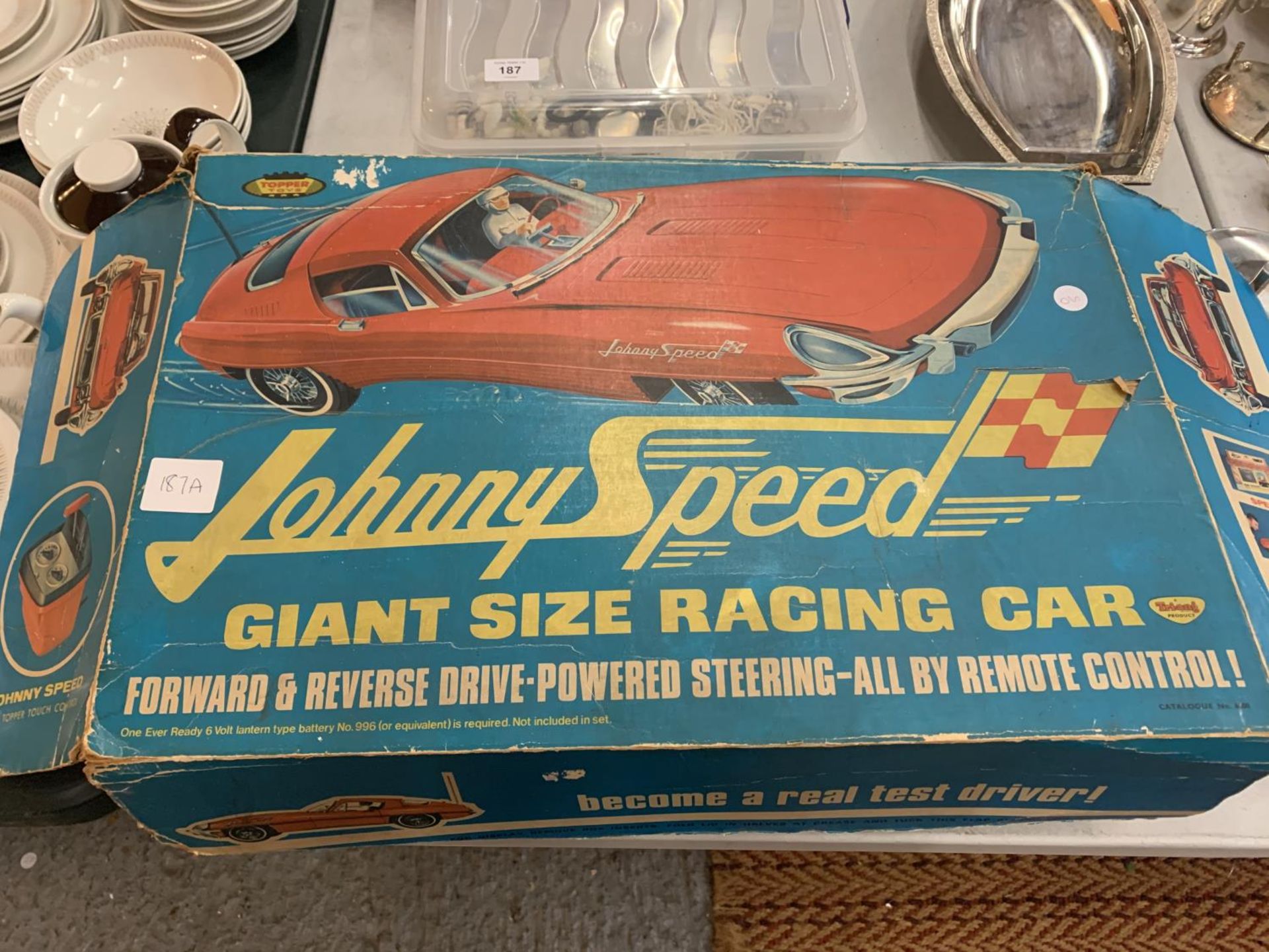 A VINTAGE TOPPER TOYS JOHNNY SPEED E-TYPE JAGUAR MODEL CAR TO INCLUDE THE ORIGINAL DRIVER AND BOX