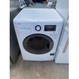 A WHITE BEKO WASHING MACHINE BELIEVED WORKING BUT NO WARRANTY