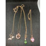 FOUR SILVER NECKLACES MARKED 925 WITH PENDANTS ALL WITH ROSE GOLD COLOUR