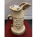 A ROYAL DOULTON JUG WITH THE WORDS 'NOW I HAVE A SHEEP, A COW EVERYBODY BIDS ME GOOD MORROW'