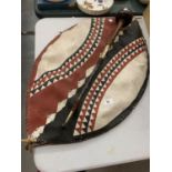 A TRIBAL MAASAI SHIELD AND A KNOBKERRY