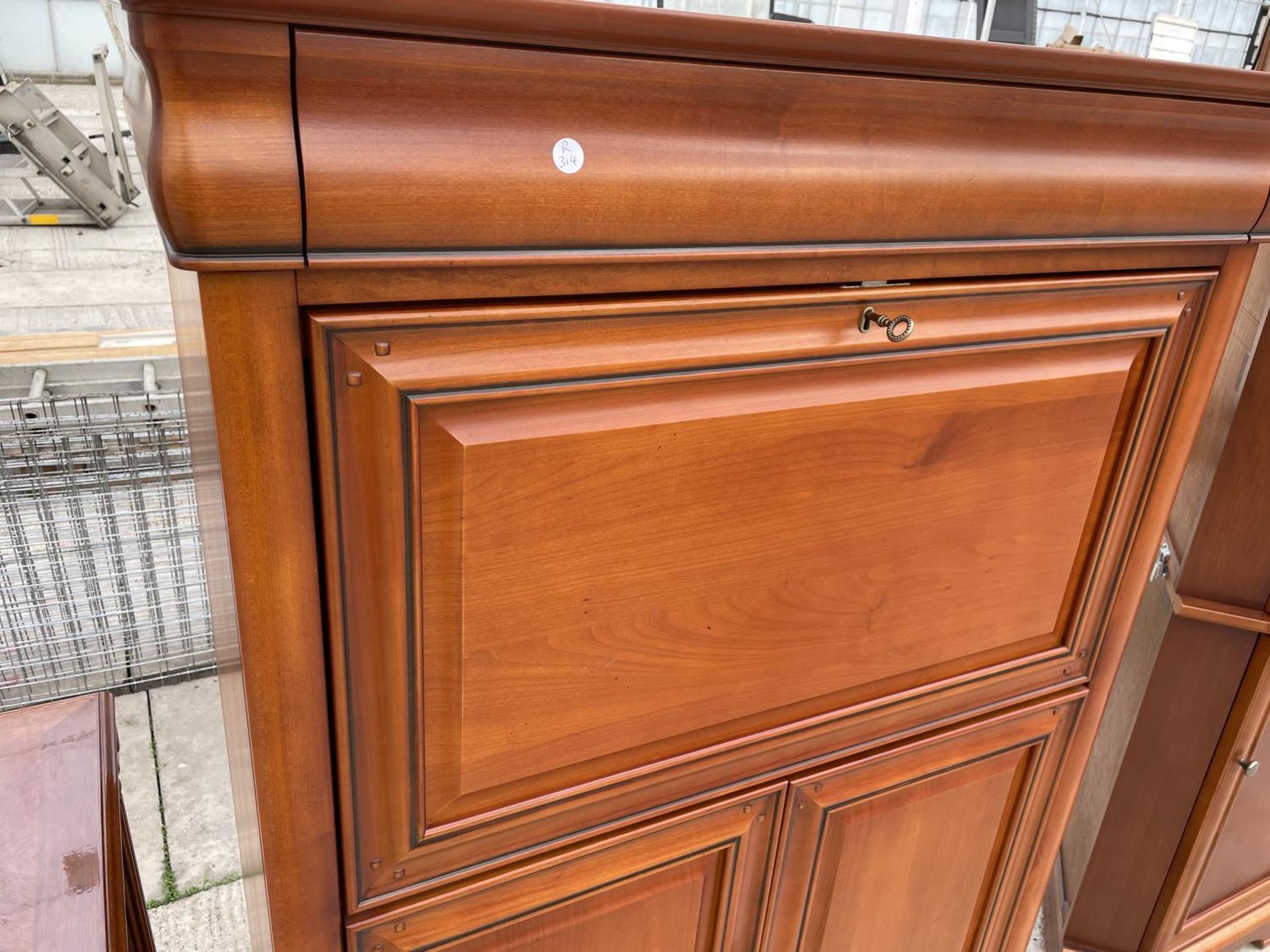 A CHERRY WOOD BUREAU CABINET WITH FALL FRONT, UPPER SECRET DRAWER AND TWO LOWER DOORS - Image 3 of 5